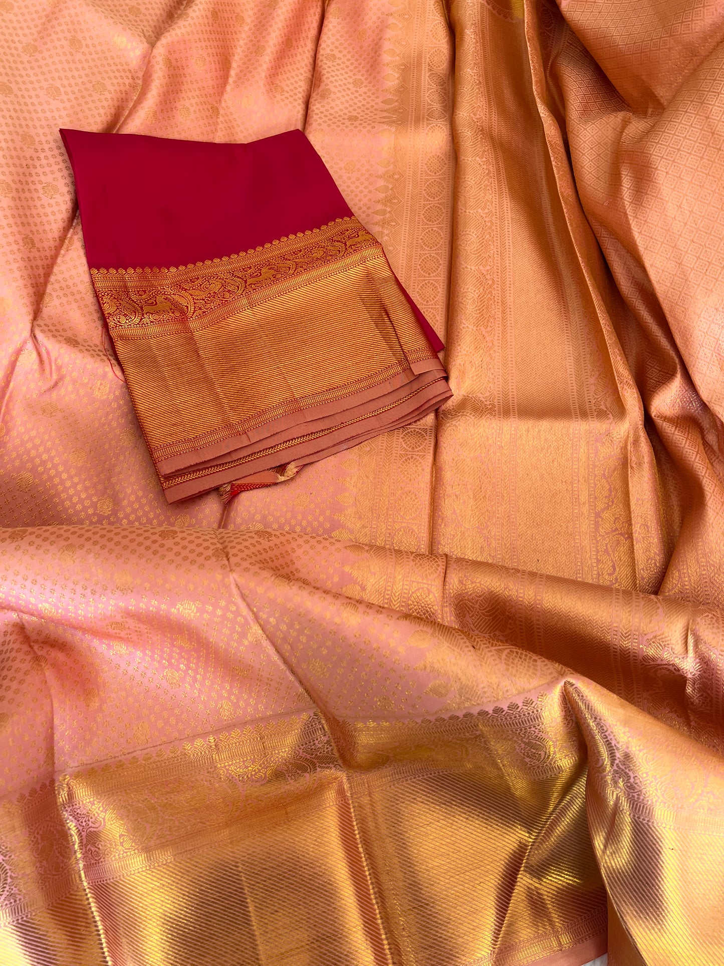 Peach Onion Pink with Gold Zari Small Peacock and Round Butta Motifs Full Body Weaved Design Zari Border Grand Tissue Silk Kanjivaram Saree