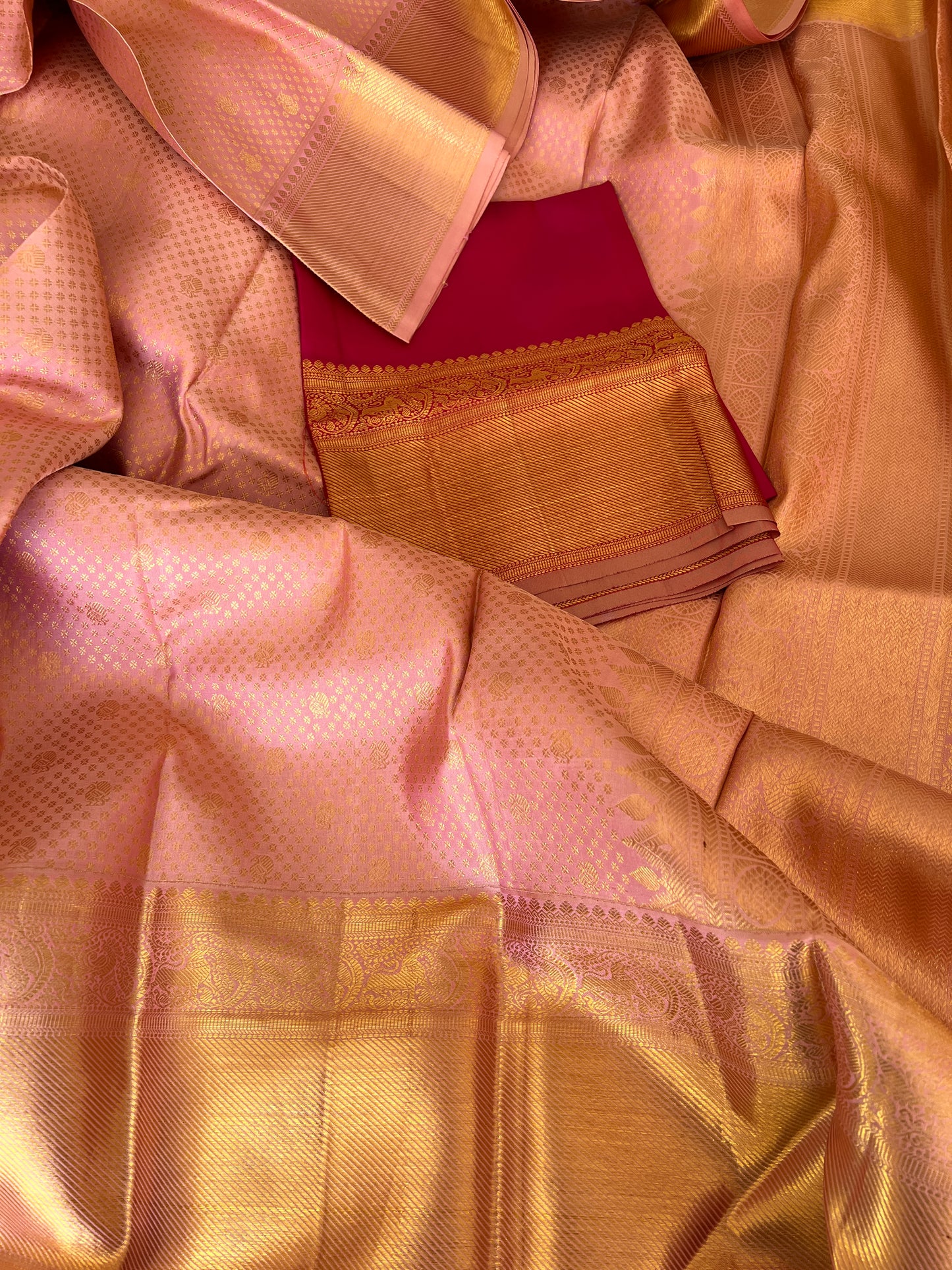 Peach Onion Pink with Gold Zari Small Peacock and Round Butta Motifs Full Body Weaved Design Zari Border Grand Tissue Silk Kanjivaram Saree