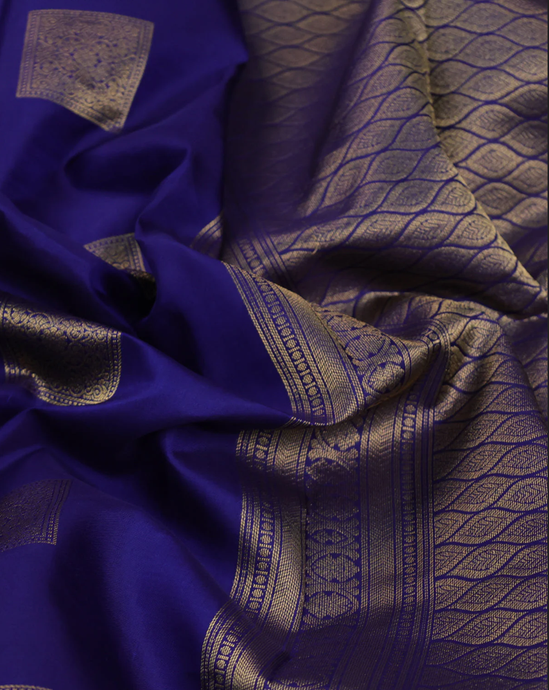 Pure kanchipuram silk saree blue and dual shade of pinkish orange with zari woven box type buttas and zari woven border