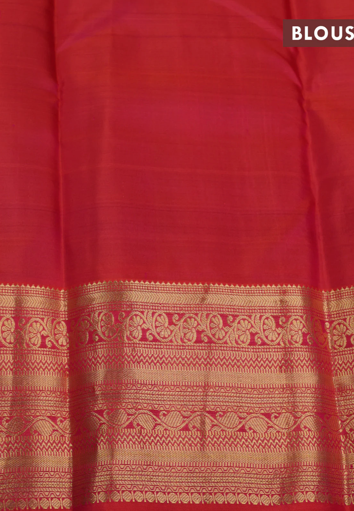 Pure kanchipuram silk saree blue and dual shade of pinkish orange with zari woven box type buttas and zari woven border