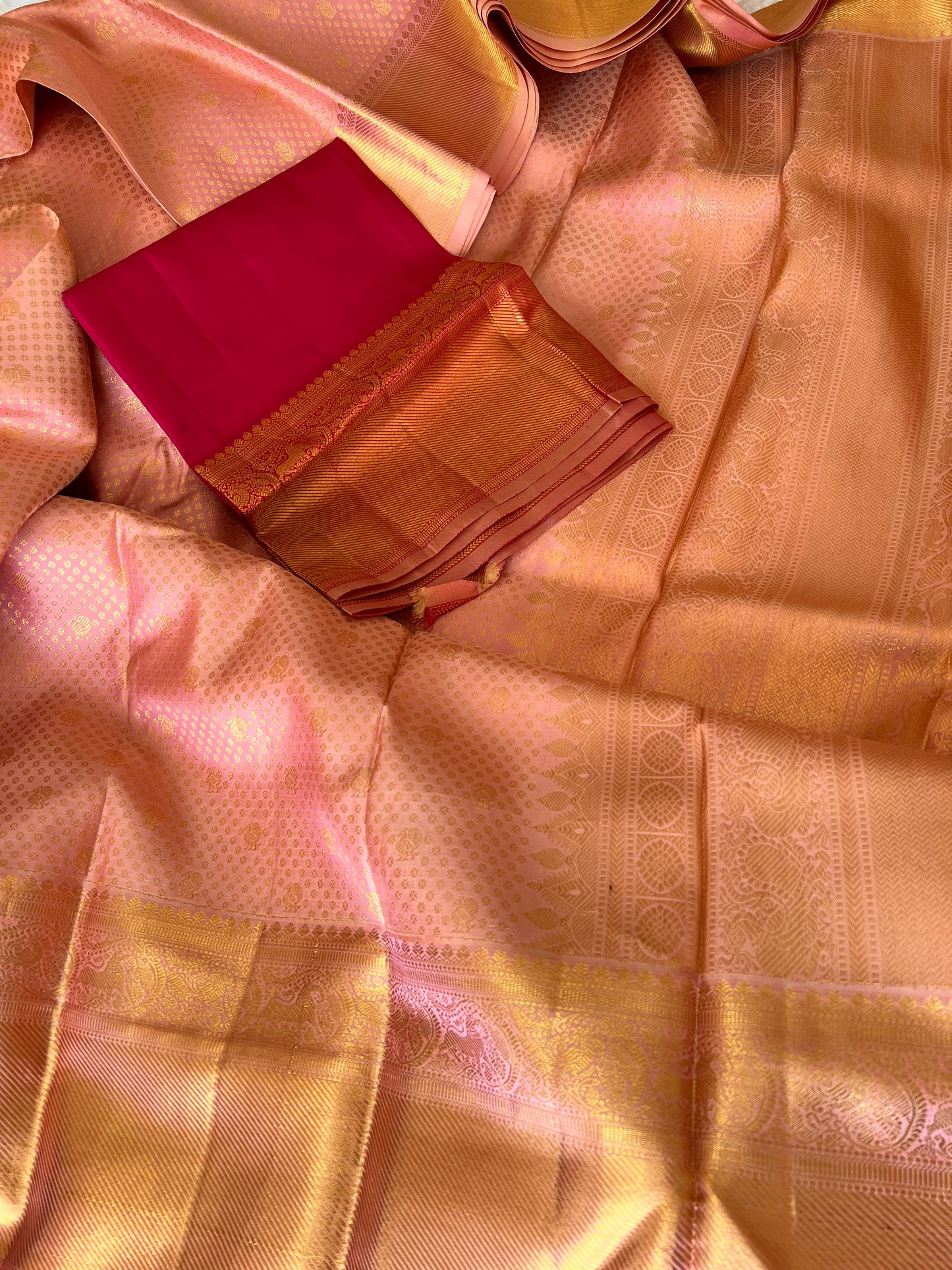 Peach Onion Pink with Gold Zari Small Peacock and Round Butta Motifs Full Body Weaved Design Zari Border Grand Tissue Silk Kanjivaram Saree