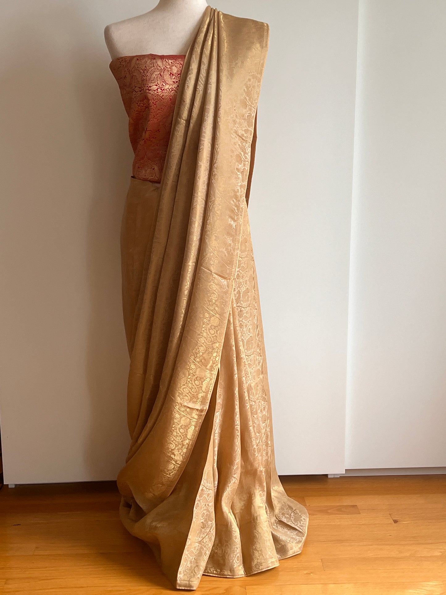 Gold Woven Viscose Fabric Saree with Unstitched Red Zari Brocade Blouse Material
