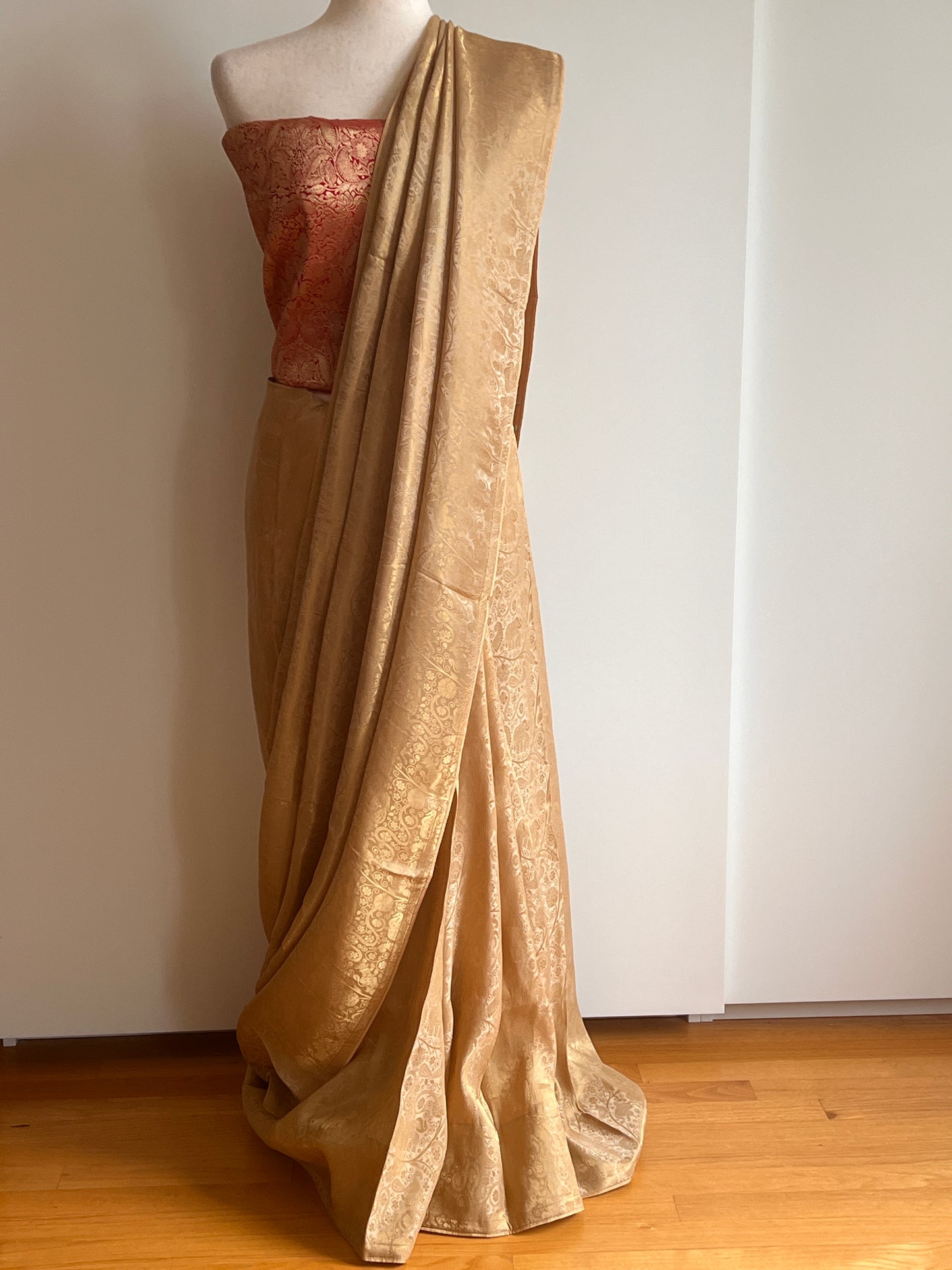 Gold Woven Viscose Fabric Saree with Unstitched Red Zari Brocade Blouse Material