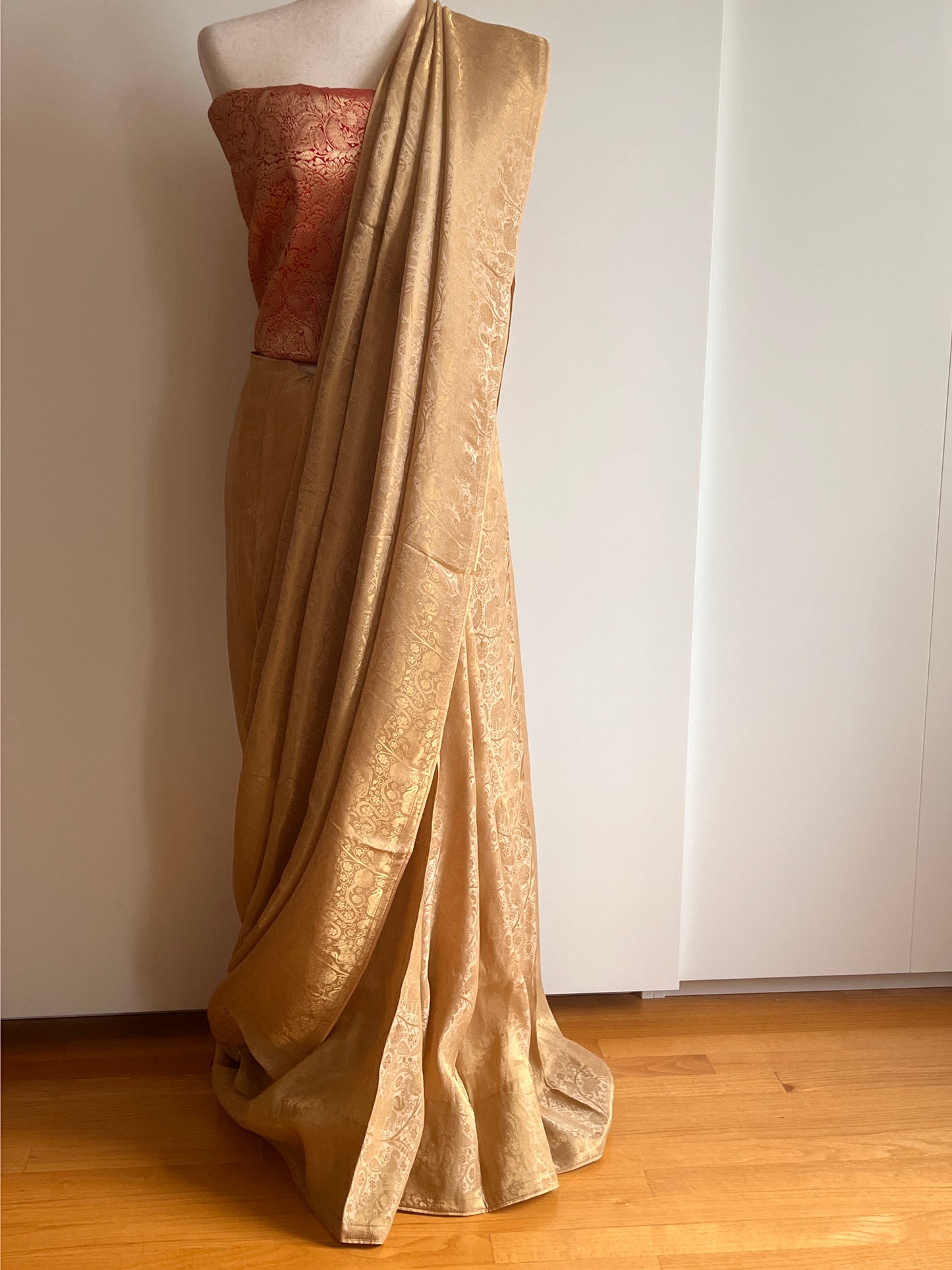 Gold Woven Viscose Fabric Saree with Unstitched Red Zari Brocade Blouse Material
