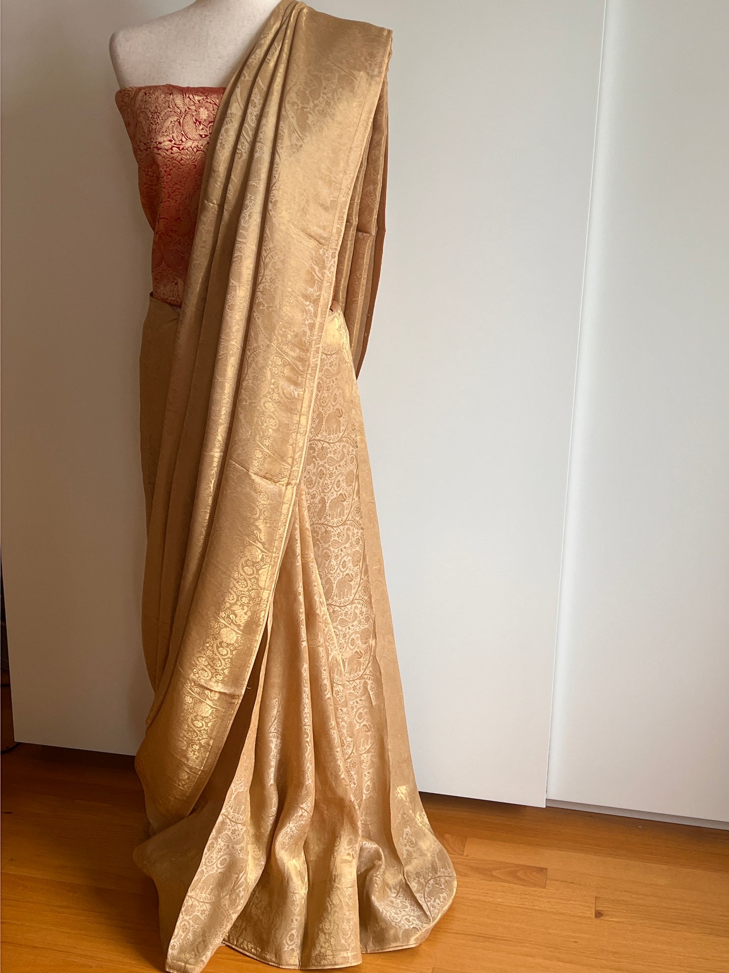 Gold Woven Viscose Fabric Saree with Unstitched Red Zari Brocade Blouse Material