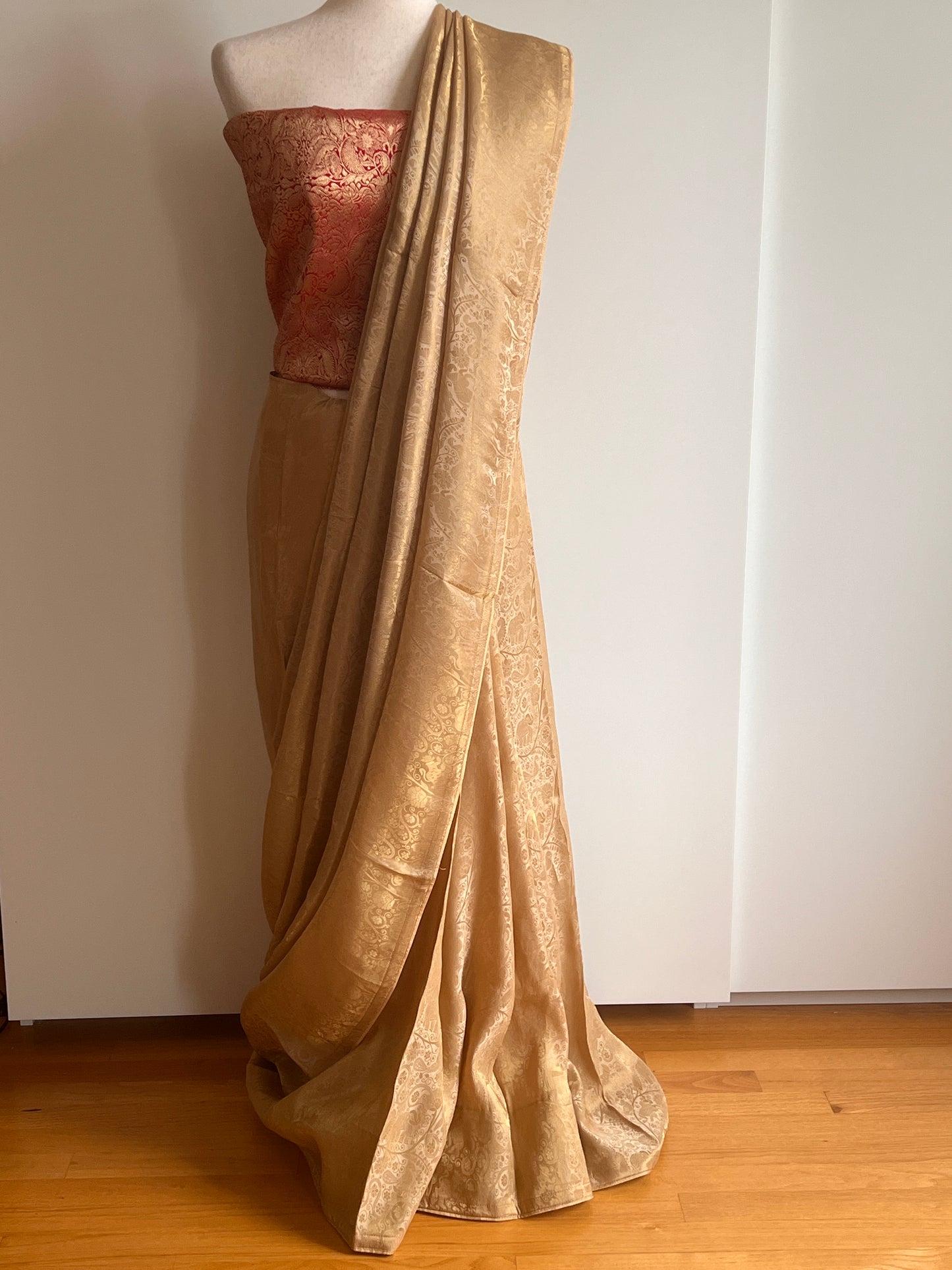 Gold Woven Viscose Fabric Saree with Unstitched Red Zari Brocade Blouse Material