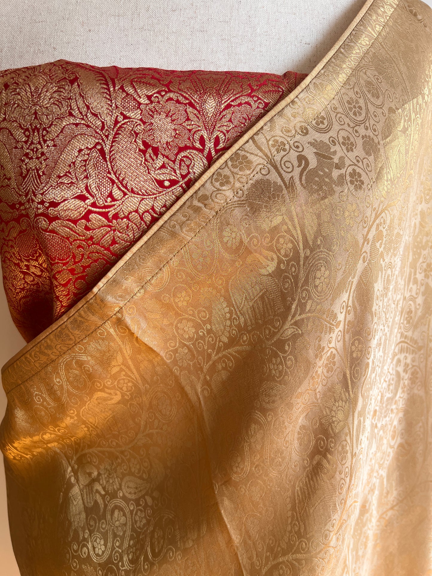 Gold Woven Viscose Fabric Saree with Unstitched Red Zari Brocade Blouse Material