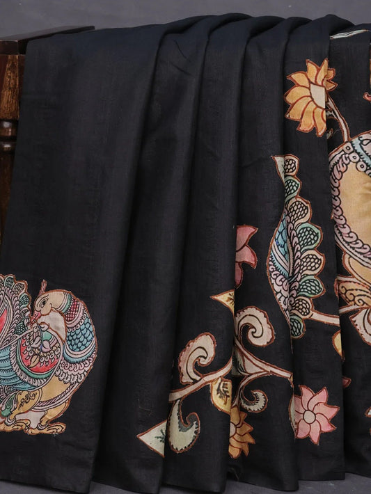 Semi tussar saree black with allover kalamkari applique work in borderless style with Stitched blouse