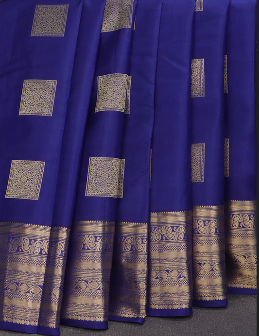 Pure kanchipuram silk saree blue and dual shade of pinkish orange with zari woven box type buttas and zari woven border