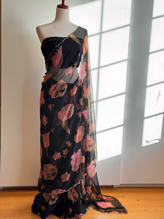 Black floral printed chiffon saree with Cut dana work