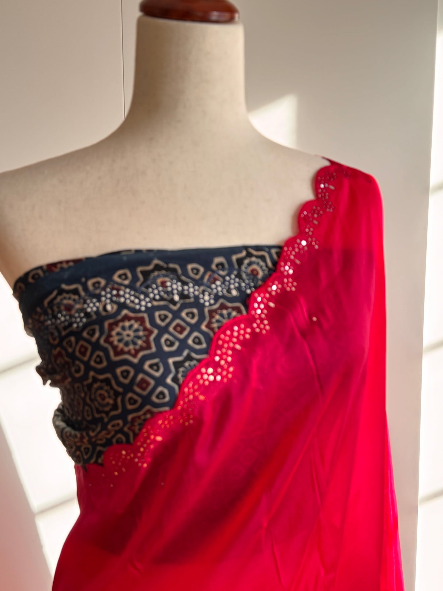 Satin crepe silk saree pink and indigo blue with mirror work and ajrakh printed blouse
