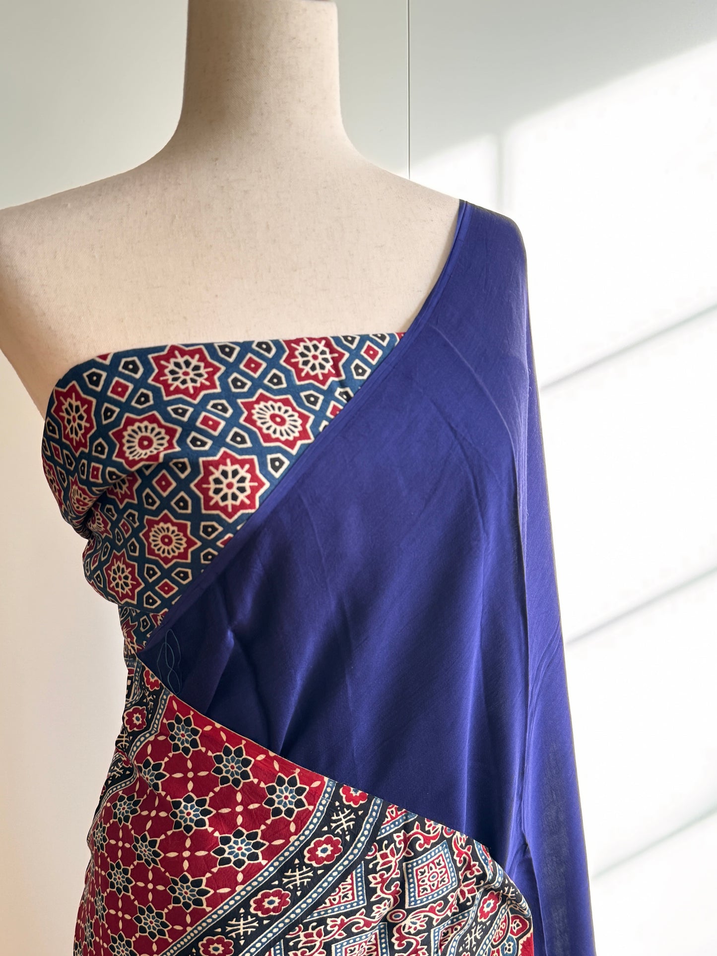 Modal silk saree blue and black with plain body and ajrakh printed pallu & blouse