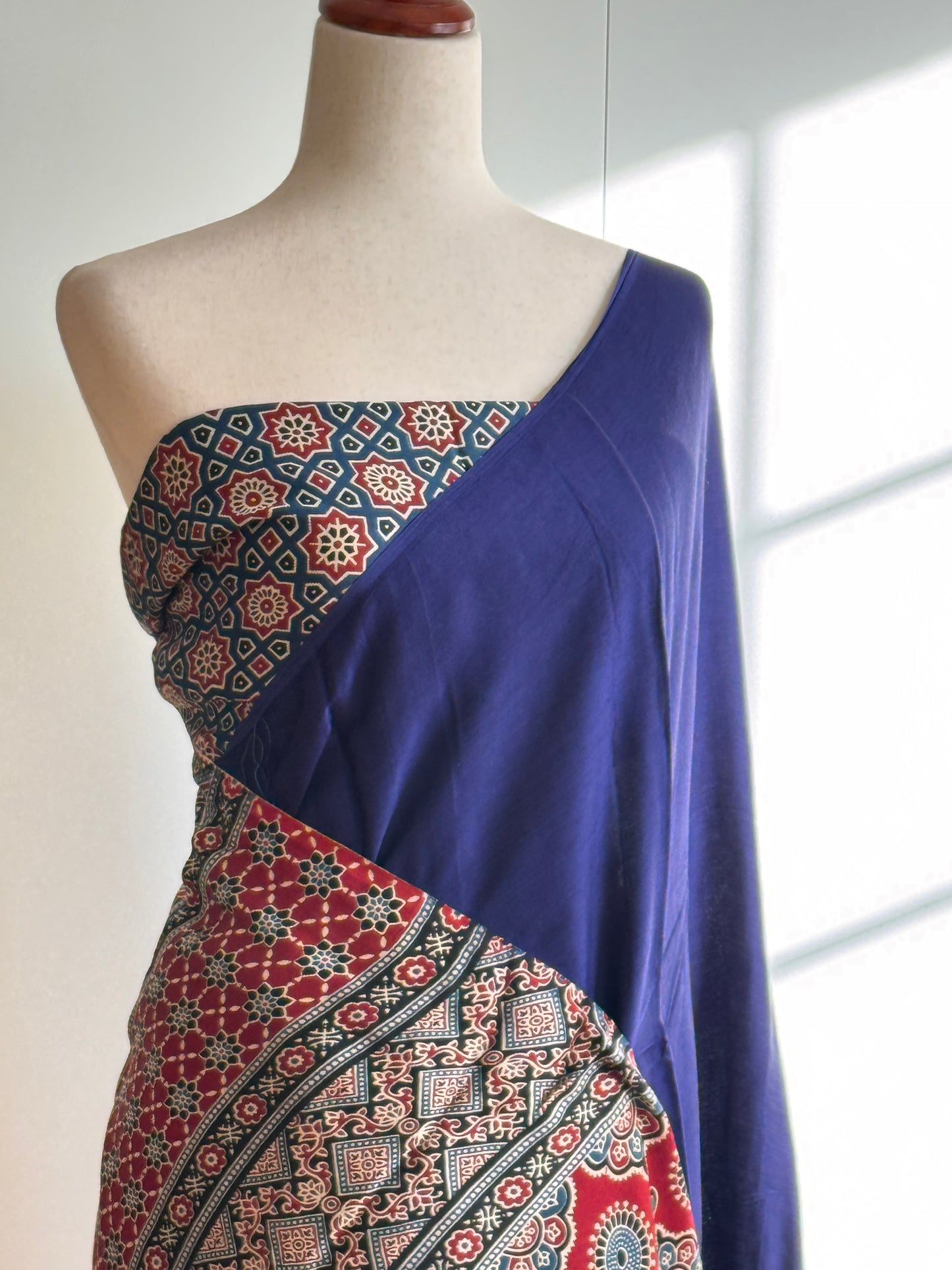 Modal silk saree blue and black with plain body and ajrakh printed pallu & blouse