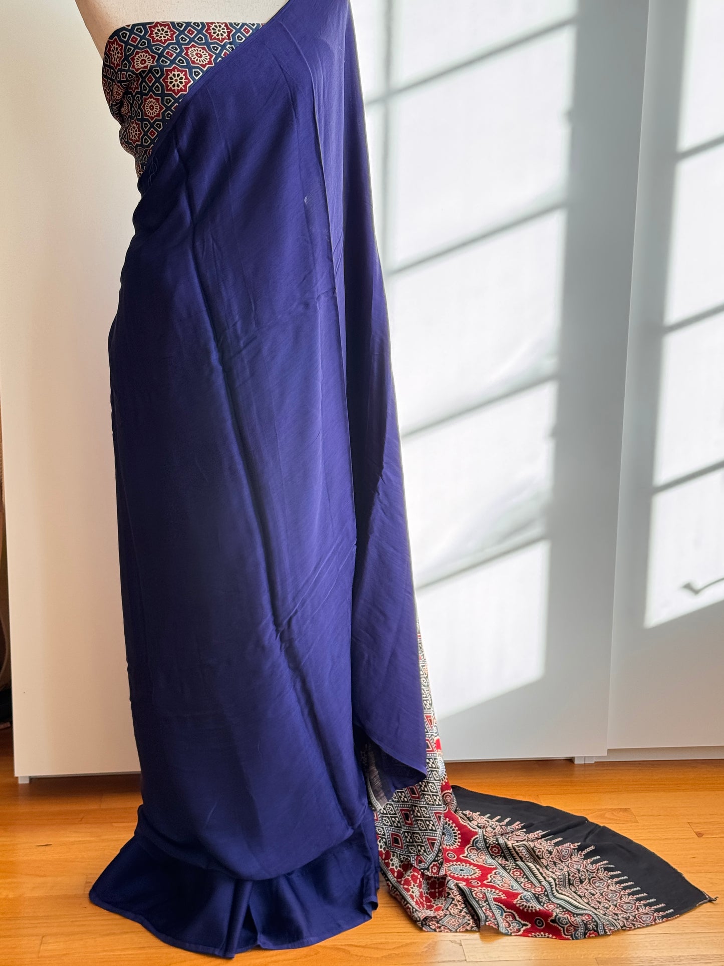 Modal silk saree blue and black with plain body and ajrakh printed pallu & blouse