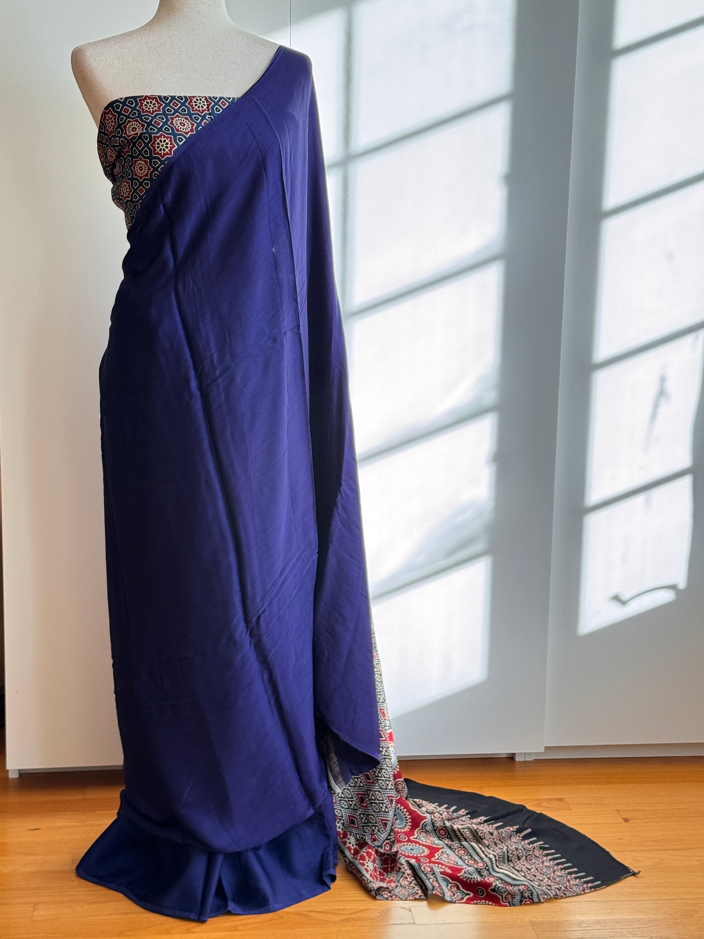 Modal silk saree blue and black with plain body and ajrakh printed pallu & blouse