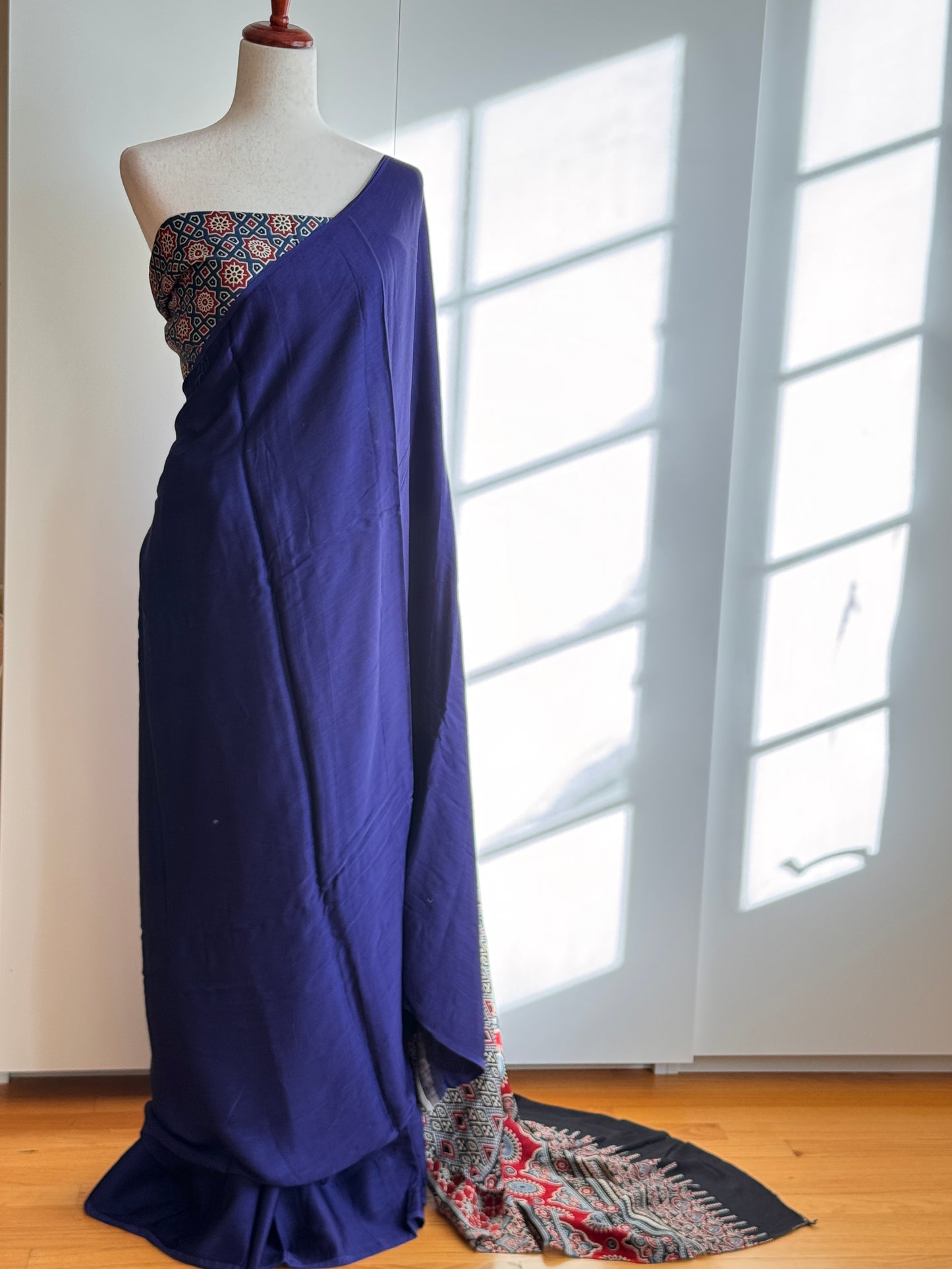 Modal silk saree blue and black with plain body and ajrakh printed pallu & blouse