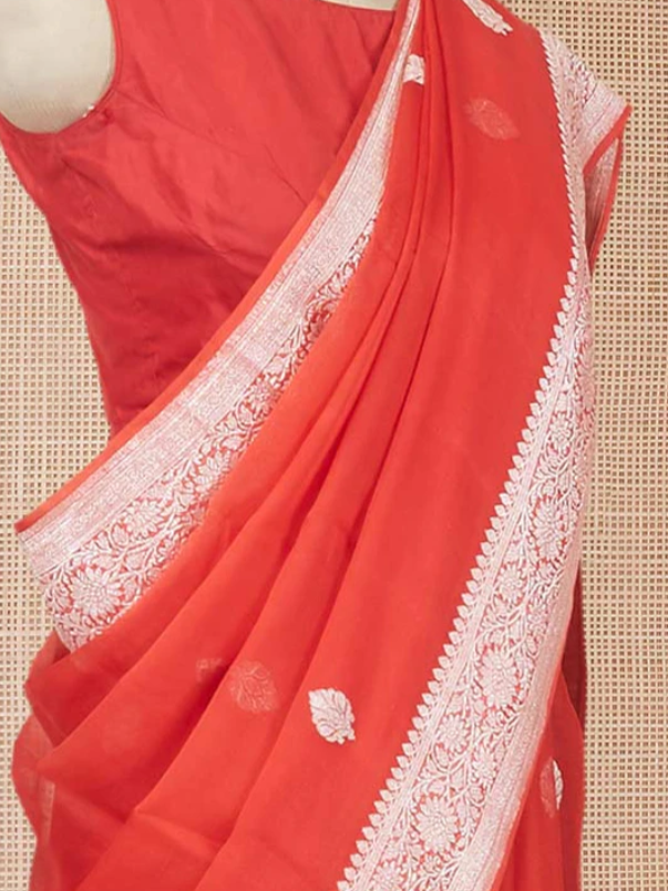 Red banarasi georgette saree with zari buttas, floral creeper zari border & pallu of paisley