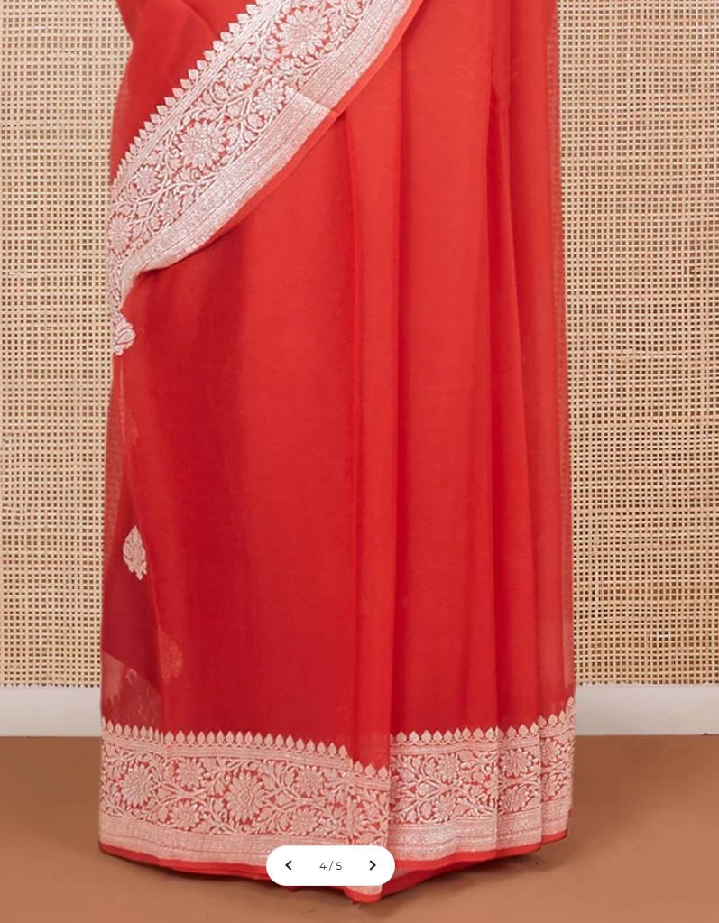Red banarasi georgette saree with zari buttas, floral creeper zari border & pallu of paisley