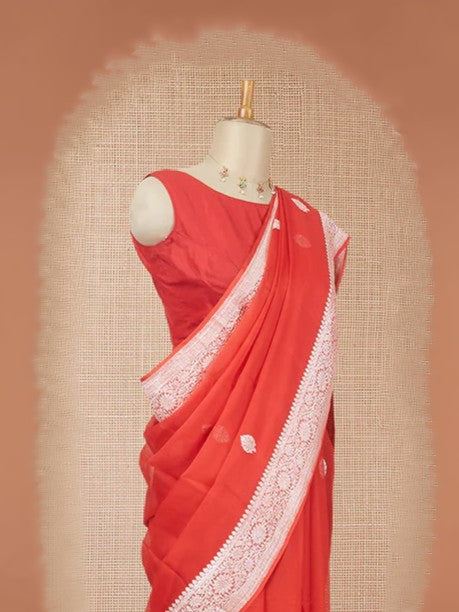 Red banarasi georgette saree with zari buttas, floral creeper zari border & pallu of paisley