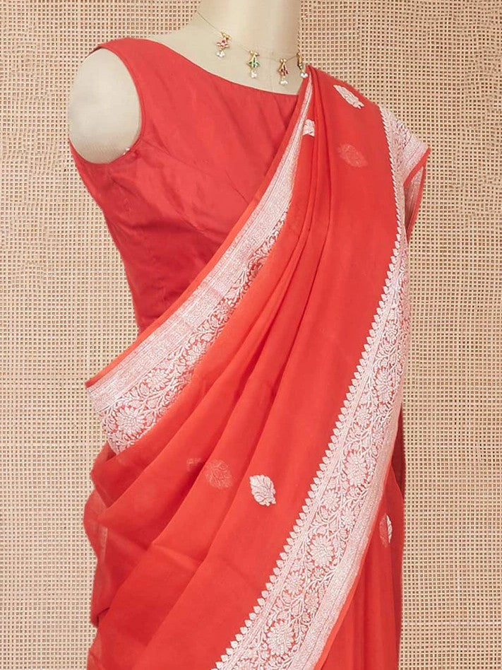Red banarasi georgette saree with zari buttas, floral creeper zari border & pallu of paisley